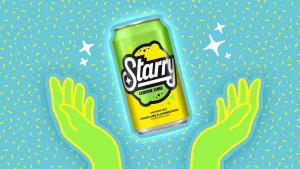 Starry soda held by two green hands in front of blue starry background.